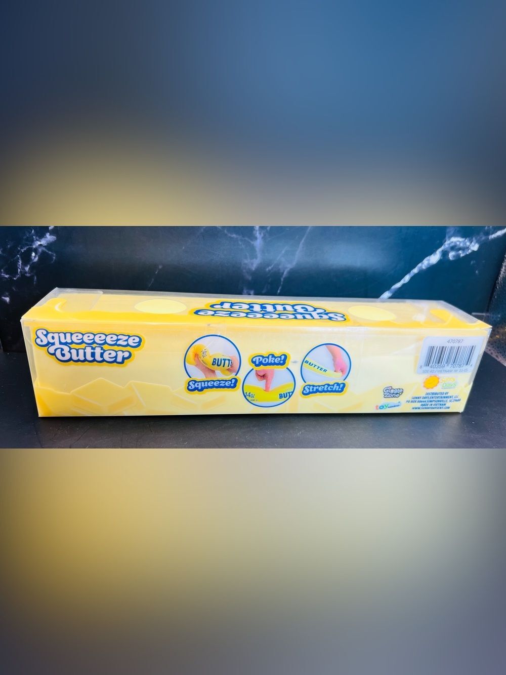 Squeeze Butter Yellow and Blue Squeeeze Butter Toy - Picture 2 of 6